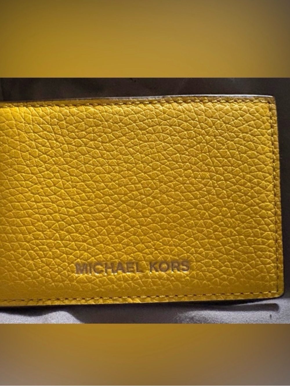 Michael Kors Pebbled Leather
Compact ID Wallet in Vibrant Yellow with Gold Logo
